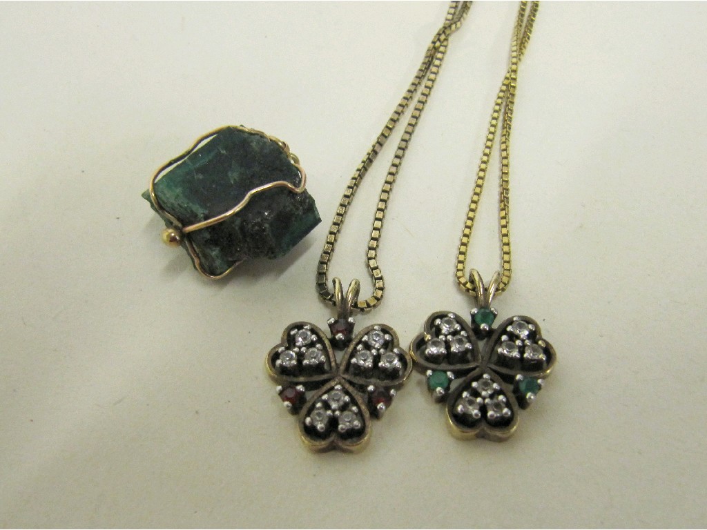 Appraisal: Lot comprising emerald pendant in yellow metal mount and two