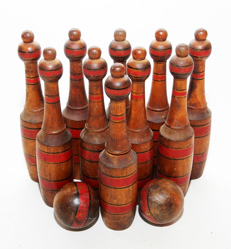 Appraisal: Wooden Bowling Set A late nineteenth century wooden bowling set