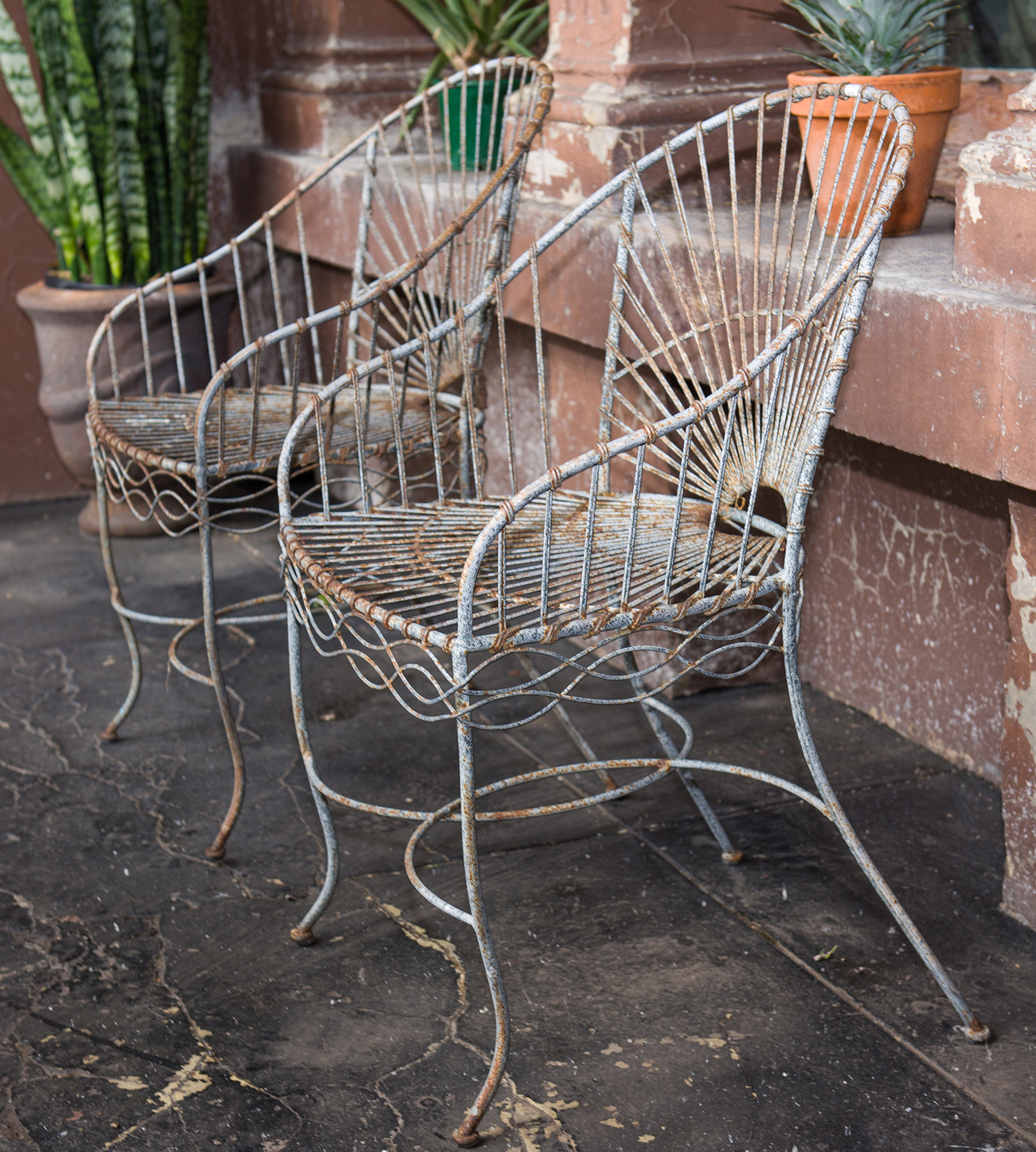 Appraisal: A PAIR OF ORNATE FRENCH METAL GARDEN CHAIRS h x