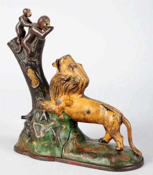 Appraisal: Cast Iron Lion Monkeys Mechanical Bank Manufactured by Kyser Rex