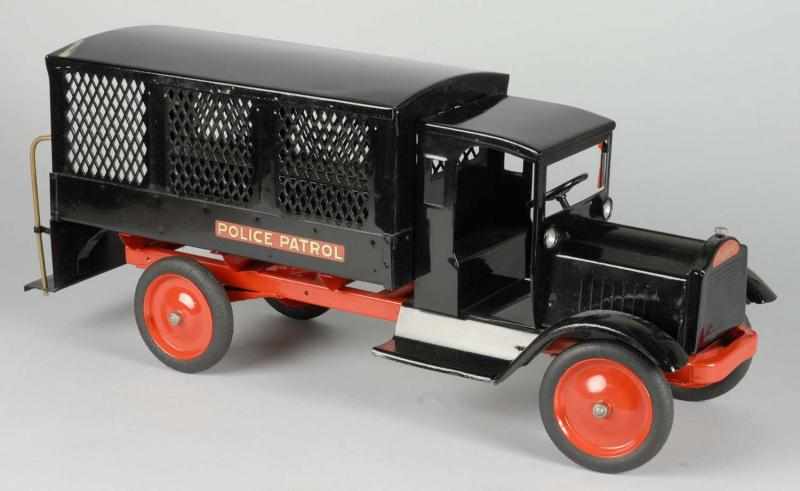 Appraisal: Lot of Pressed Steel Trucks Description Includes a Keystone Police