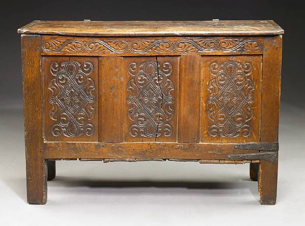 Appraisal: A North European carved oak coffer late th century height