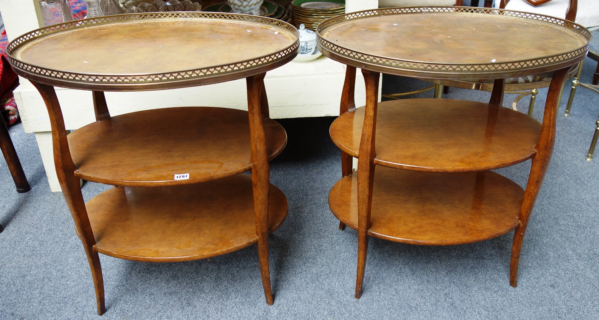 Appraisal: A pair of gilt metal mounted three tier side tables