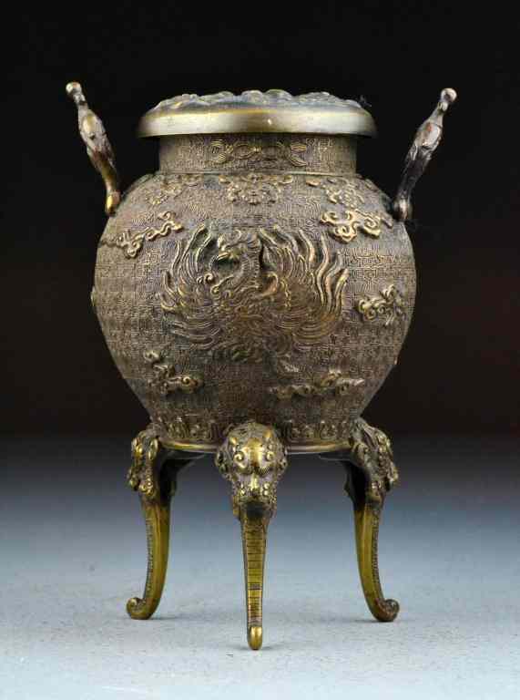 Appraisal: Japanese Meiji Bronze Tripod CensorFinely molded to depict a dragon