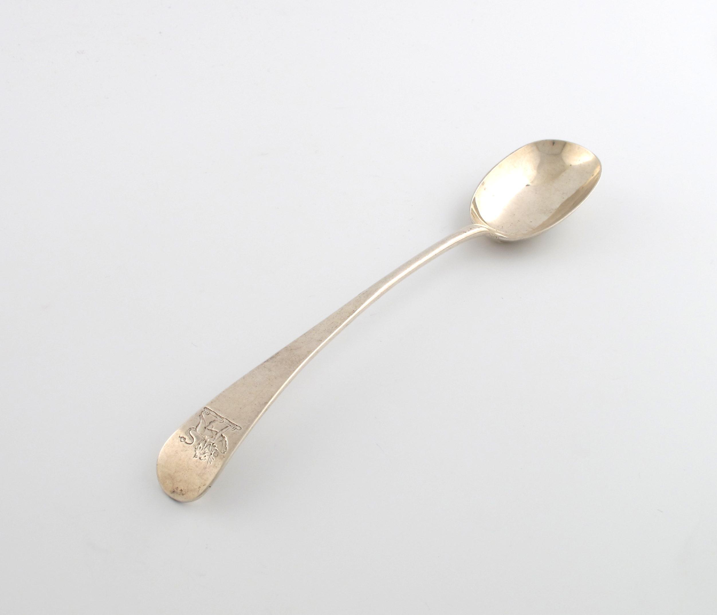 Appraisal: A George III provincial silver Old English pattern salad spoon