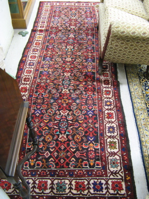 Appraisal: PERSIAN TRIBAL AREA RUG northwestern Iran colorful Herati floral motif