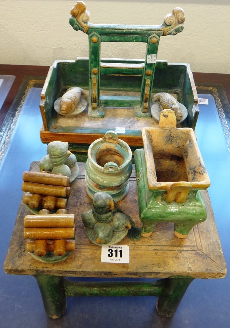 Appraisal: A group of Chinese green and ochre glazed pottery models