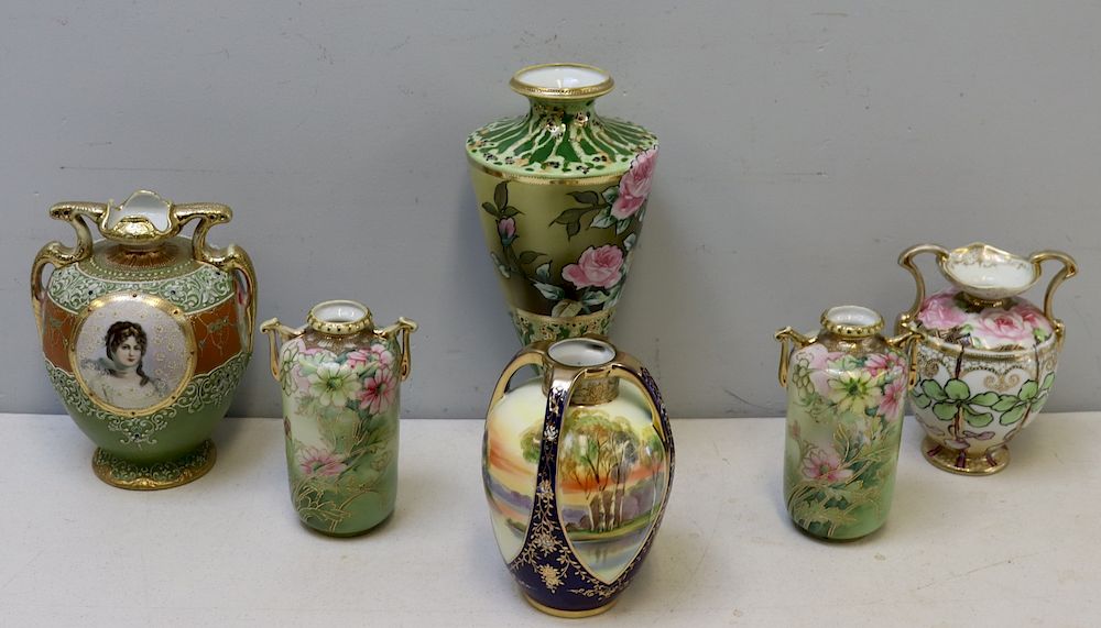 Appraisal: Nippon Grouping Of Japanese Porcelain Vases To include a pair