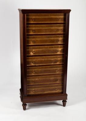 Appraisal: A late th Century Wellington chest of eight drawers with