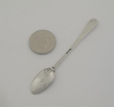 Appraisal: A George II III miniature fancy-back spoon with a fancy