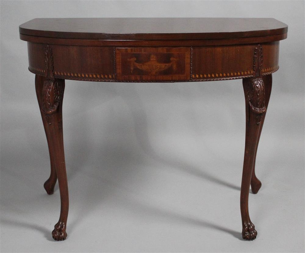 Appraisal: GEORGE III STYLE INLAID AND CARVED MAHOGANY EXPANDING GAMES TABLE