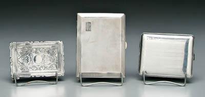 Appraisal: Three silver cases one English silver cigarette case rectangular with