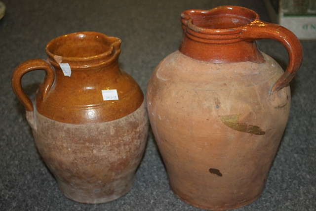 Appraisal: TWO WEST COUNTRY POTTERY JUGS circa cm High and a