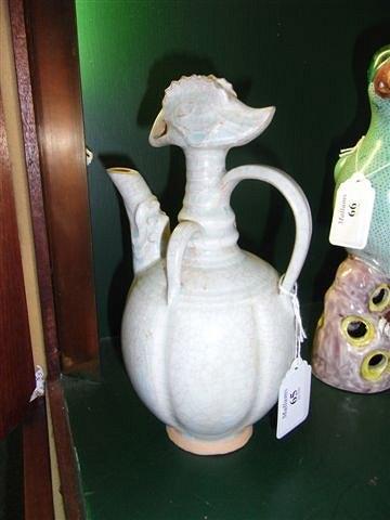 Appraisal: A CHINESE QUINGBAI CHICKEN HEAD EWER with crackle glaze high