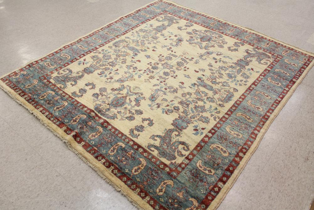 Appraisal: HAND KNOTTED ORIENTAL CARPET Pakistani Persian blue floral design on