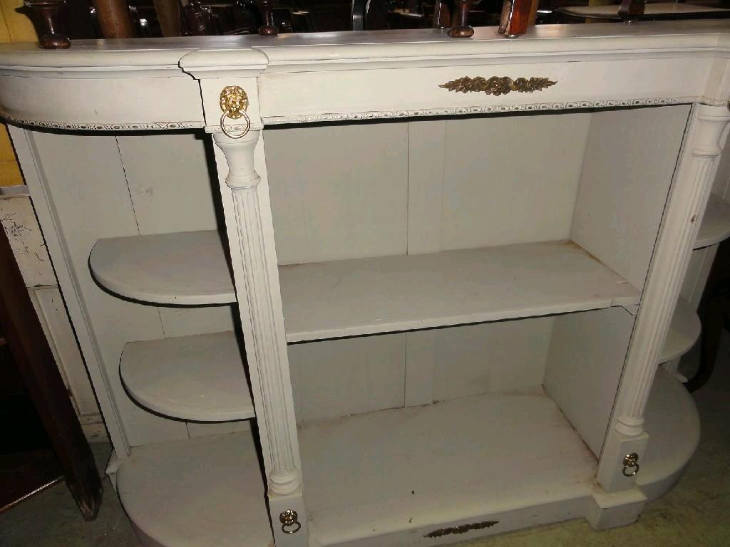 Appraisal: A decorative painted 'D' ended open side cupboard enclosing fixed