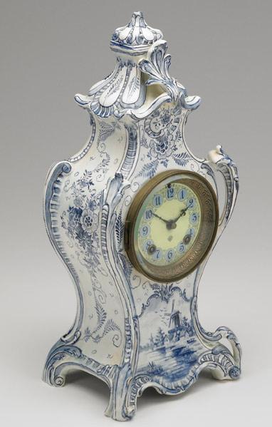 Appraisal: ANSONIA SHELF CLOCK Royal Bonn Delft pattern china case time