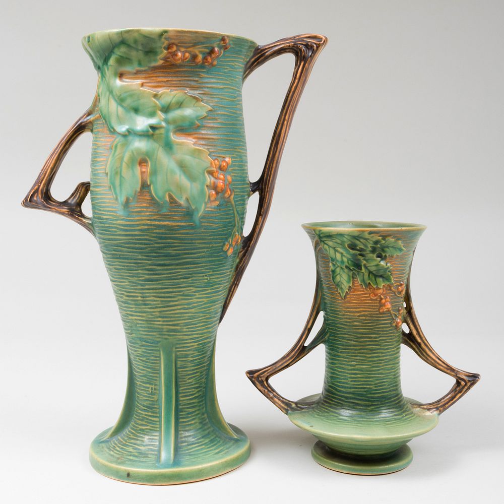 Appraisal: Two Roseville Pottery Glazed 'Bushberry' Vases Cast signature The larger