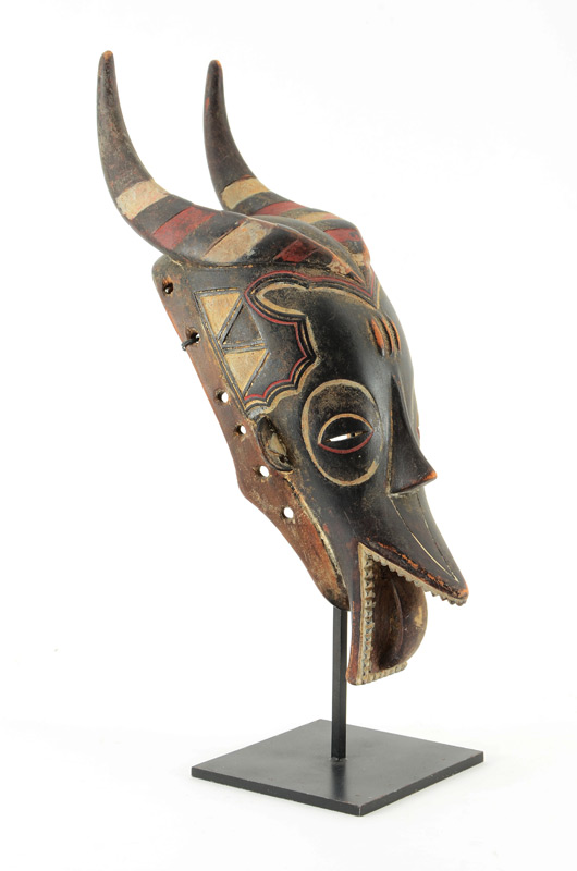 Appraisal: AFRICAN GURO ZAMBLE MASK IVORY COAST The zamble masks combine