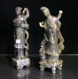 Appraisal: A pair of th century carved jade figures together with