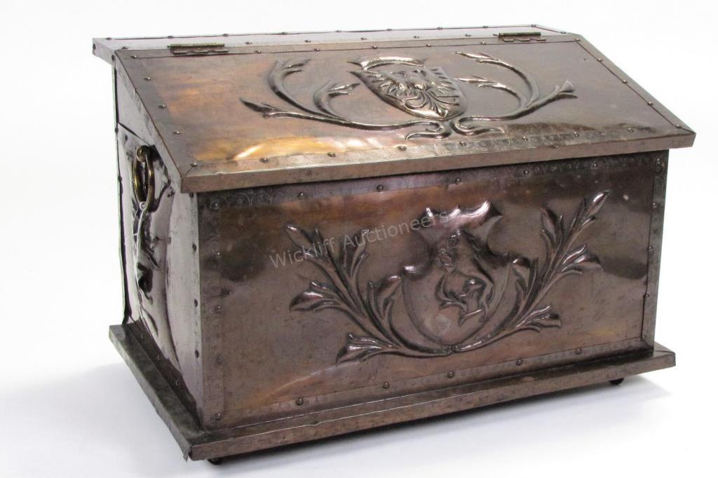 Appraisal: A metal clad wooden tinder box German type with embossed