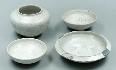 Appraisal: Four Ben Owen pottery bowls all with white glaze rose