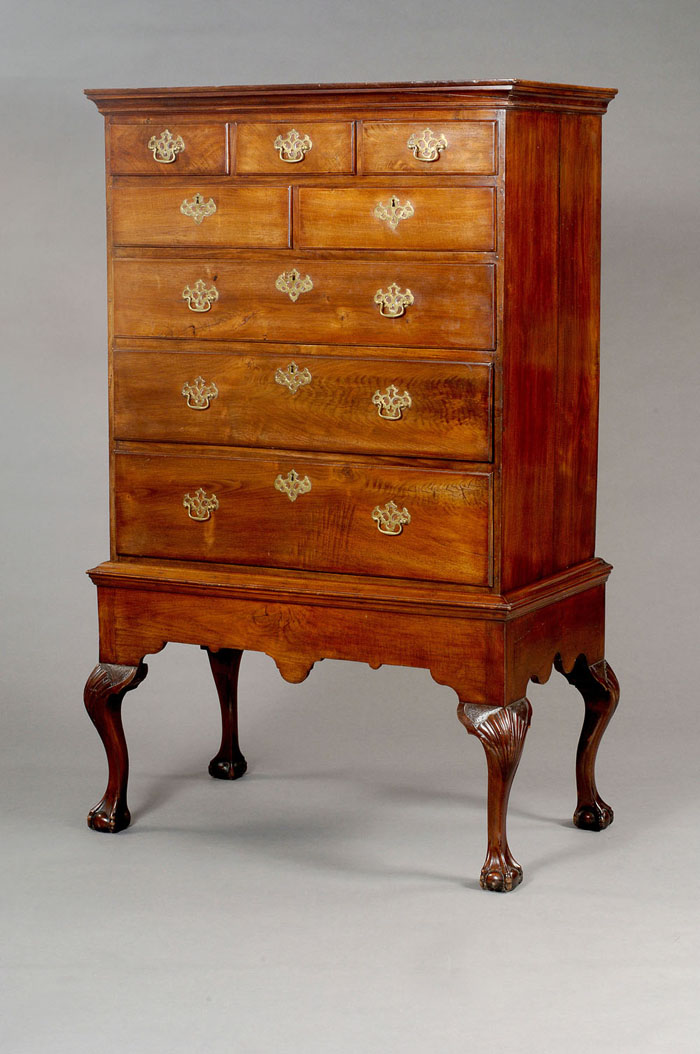 Appraisal: PENNSYLVANIA CHIPPENDALE FIGURED WALNUT CHEST-ON-FRAME The rectangular molded cornice on