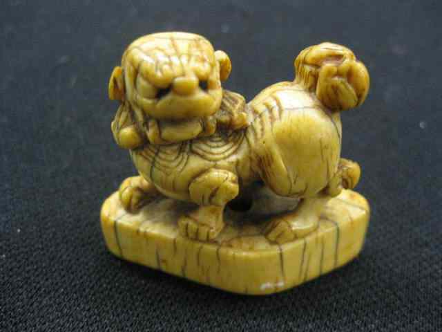 Appraisal: Chinese Carved Ivory Netsuke of a Shishi '' tall ''