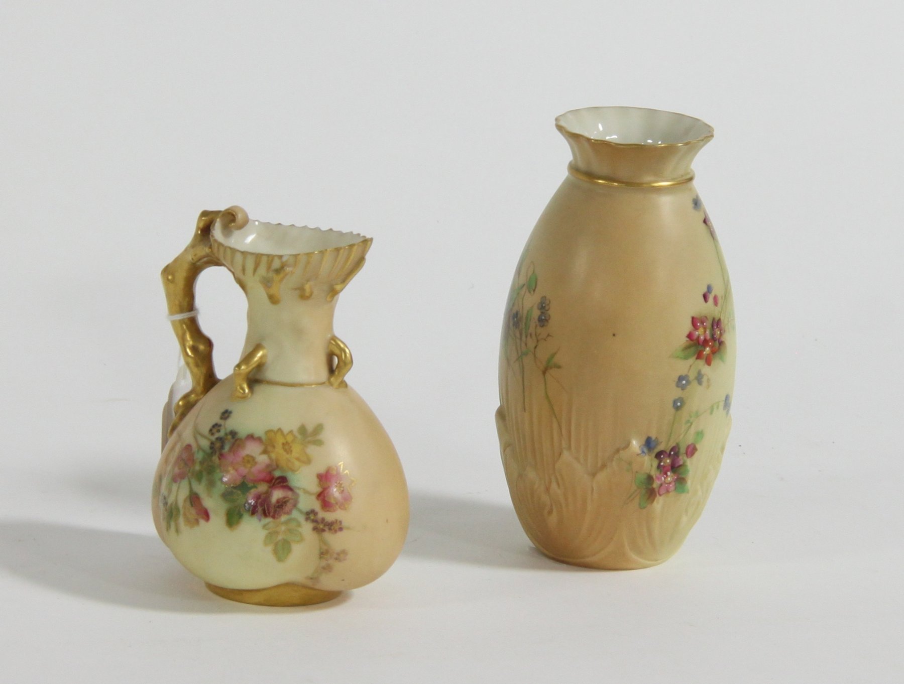 Appraisal: A Royal Worcester blush ivory jug painted summer flowers no