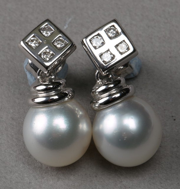 Appraisal: A PAIR OF PEARL AND DIAMOND SET EARRINGS a square