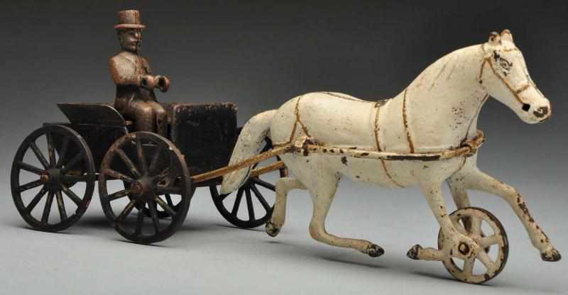 Appraisal: Cast Iron -Wheel Dr 's Cart Horse-Drawn Toy Description American