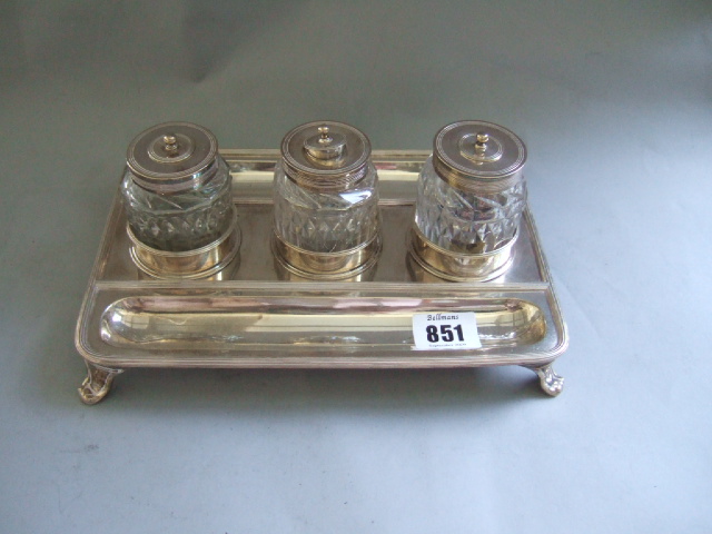 Appraisal: A silver rectangular inkstand decorated with reeded edges and raised