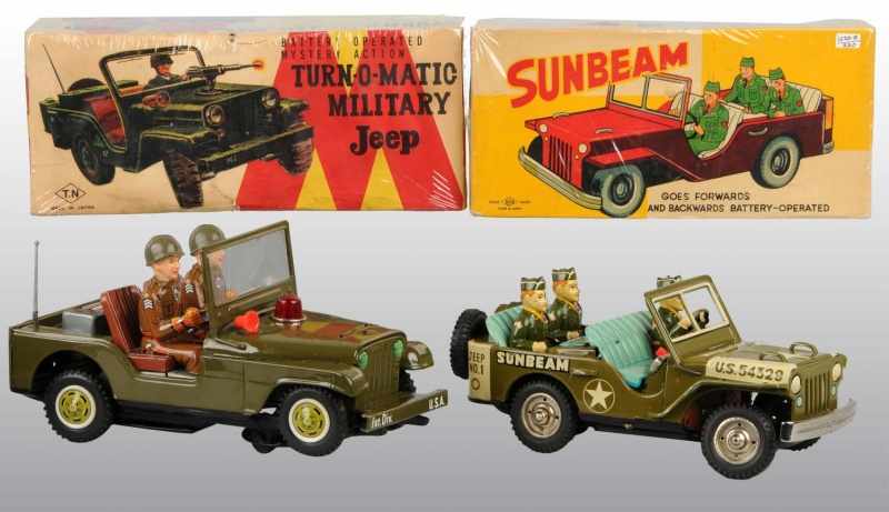 Appraisal: Lot of Tin Litho Military Jeep Toys Description Japanese Working