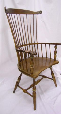 Appraisal: Pair of comb back Windsor arm chairs stamped Frederick Duckloe