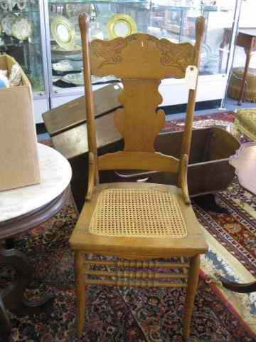 Appraisal: Victorian Oak Side Chair pressed back and cane seat