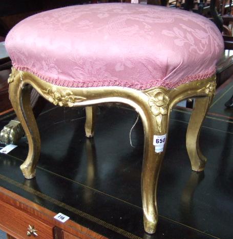 Appraisal: A Louis XV style foot stool the over stuffed serpentine