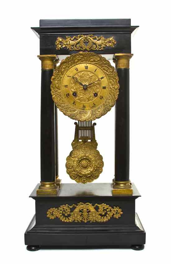 Appraisal: A French Gilt Bronze Mounted Portico Clock having stepped corners