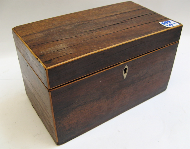 Appraisal: A BRITISH MAHOGANY TEA CADDY with inset banded edges and