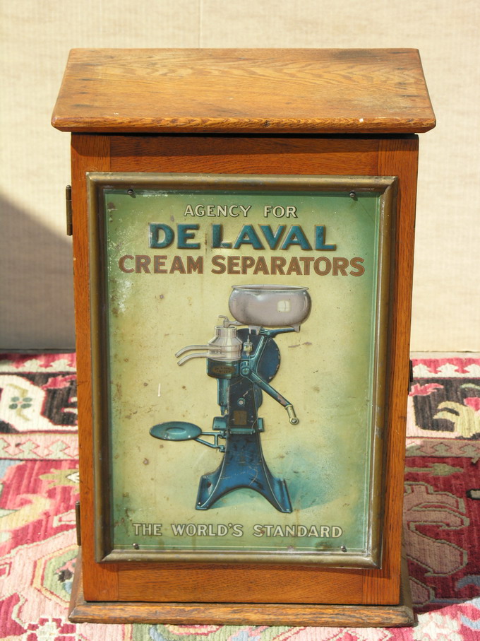 Appraisal: DE LAVAL COUNTRY STORE ADVERTISING CABINET Tin litho front door