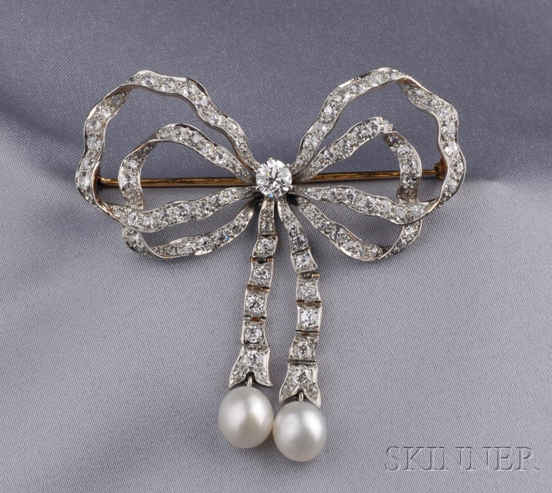 Appraisal: Edwardian Diamond and Pearl Ribbon Brooch the bow with flexible