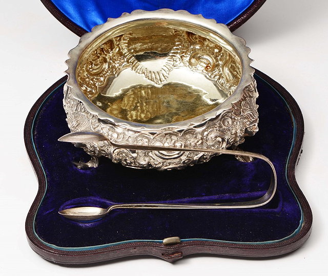 Appraisal: A VICTORIAN SILVER SUGAR BASIN with wavy edge rim chased