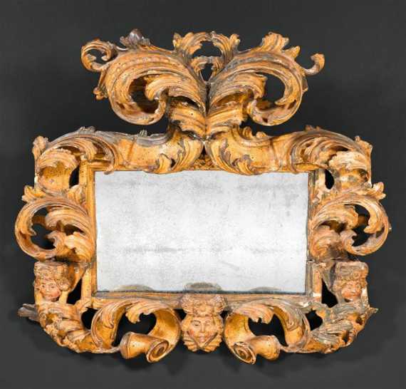 Appraisal: CARTOUCHE MIRROR AUX TETES D'ENFANTS Baroque Venice circa Pierced and