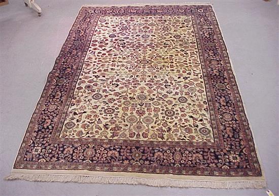 Appraisal: Modern Indo-Persian rug with salmon green and floral decoration on