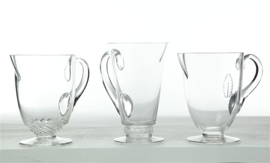 Appraisal: THREE LALIQUE PITCHERS France th century glass A pitcher with