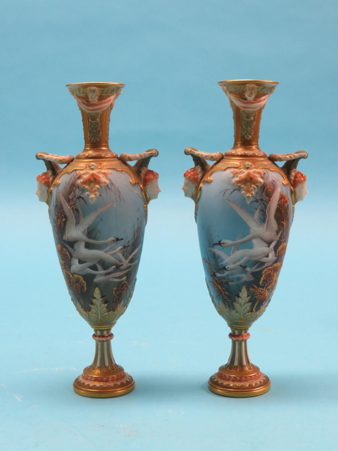 Appraisal: A pair of Royal Worcester vases painted by Charles Baldwyn