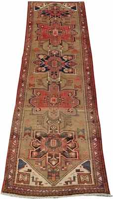 Appraisal: A Persian Heriz Runner Apprx '- x '- Low wool