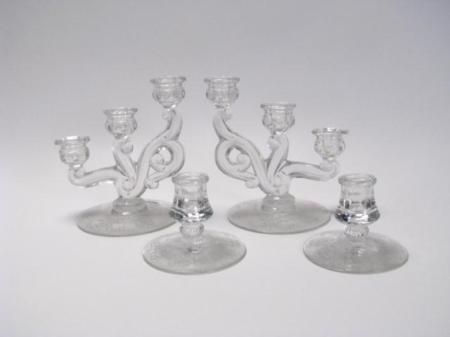 Appraisal: Group of vintage candle sticks and candle wick including pair