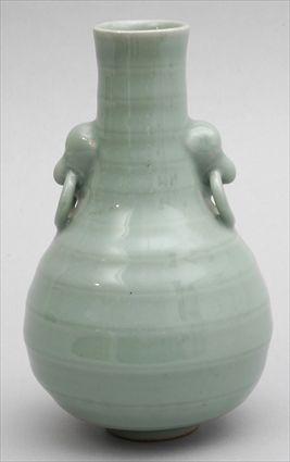 Appraisal: CHINESE CELADON-GLAZED PORCELAIN VASE The ringed pear-form bowl with molded