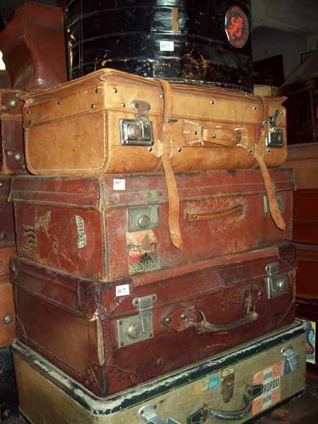 Appraisal: A COLLECTION OF FIVE LEATHER PERIOD SUITCASES AND ONE EDWARDIAN