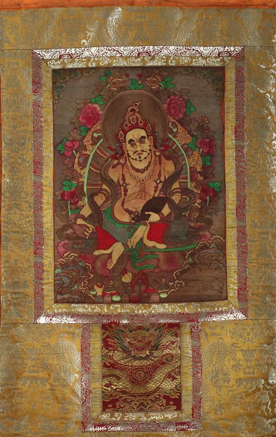 Appraisal: TIBETAN SILK THANGKA Depicting Jambhala seated at ease holding mongoose